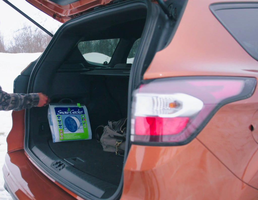 SnowGecko bag stored in a trunk of a SUV